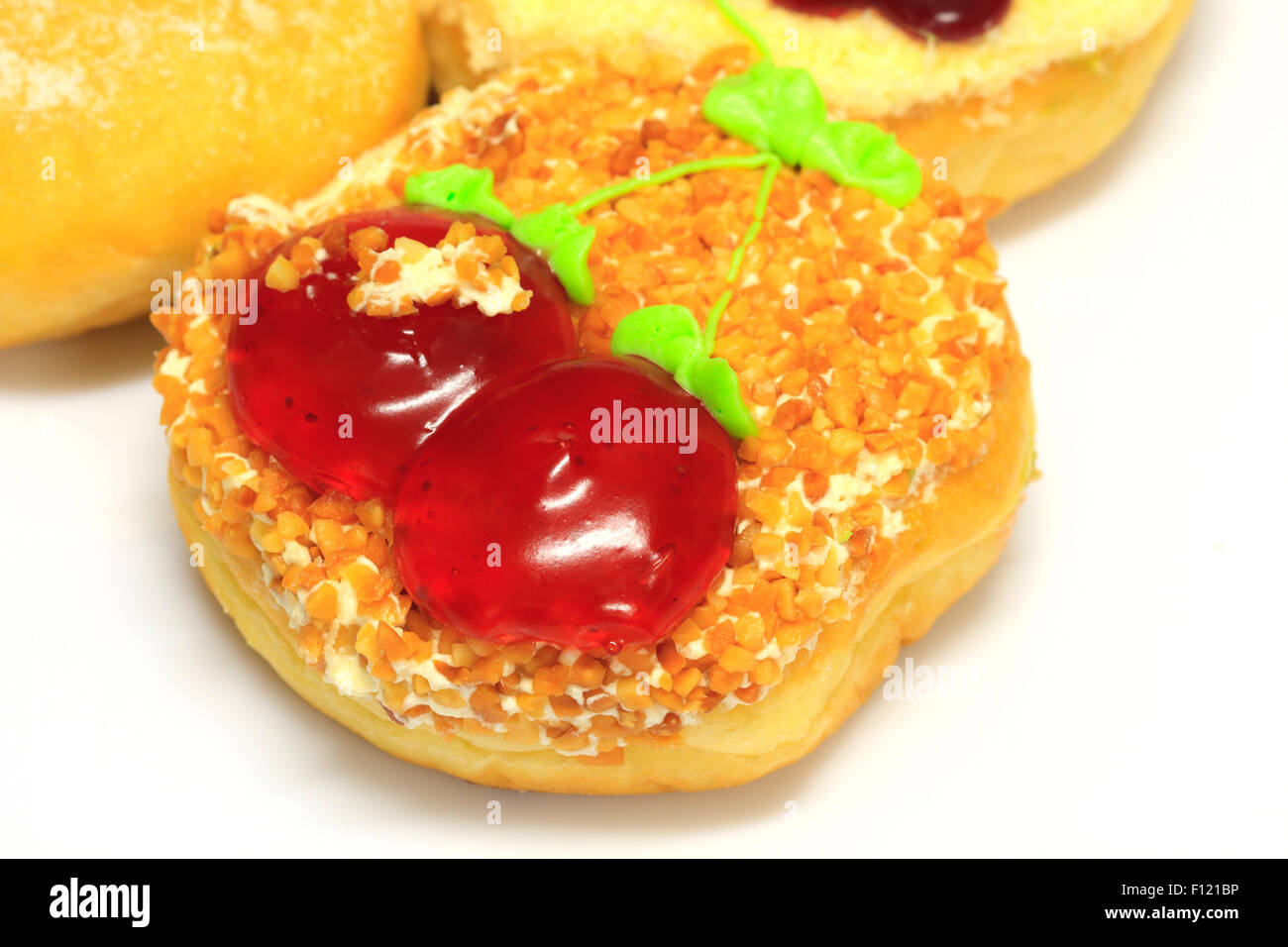 close up delicious Colorful donut on white background Stock Photo - Alamy