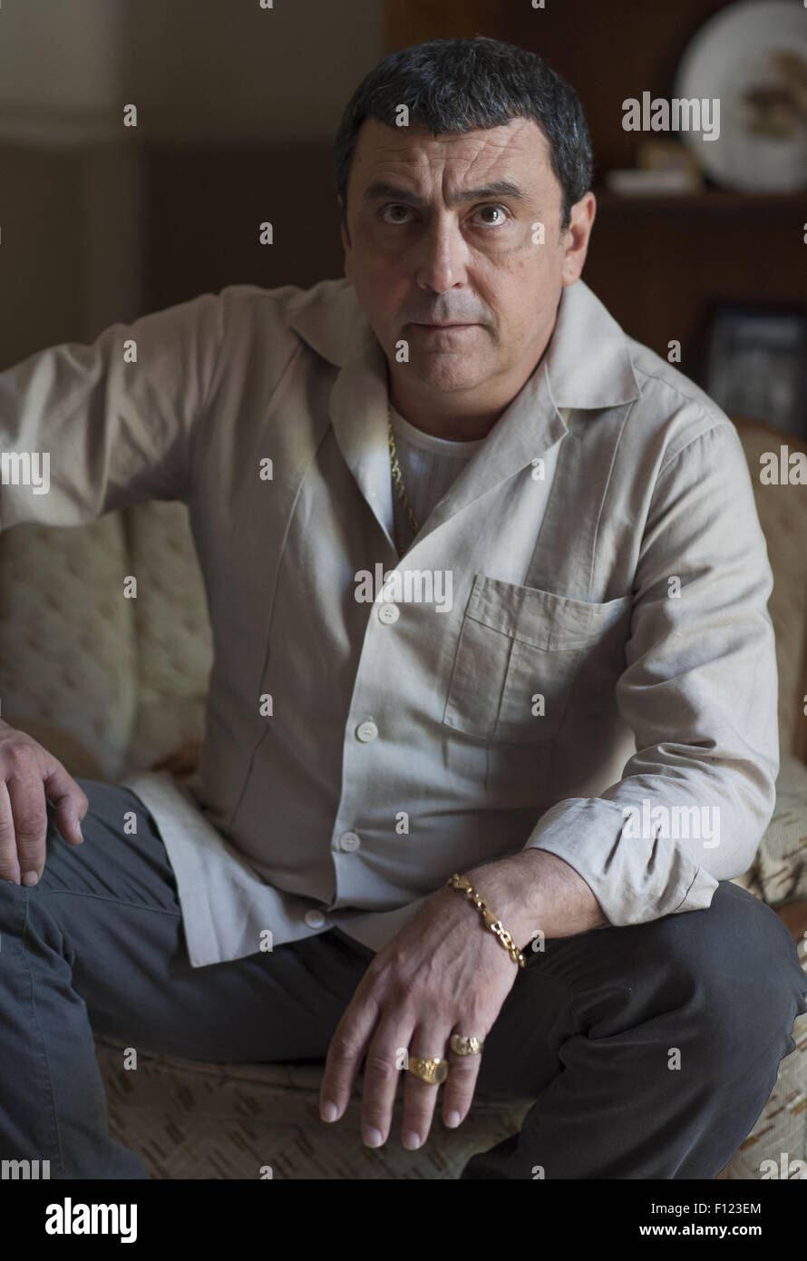 Paco Tous poses for pictures during a break in filming for TV show