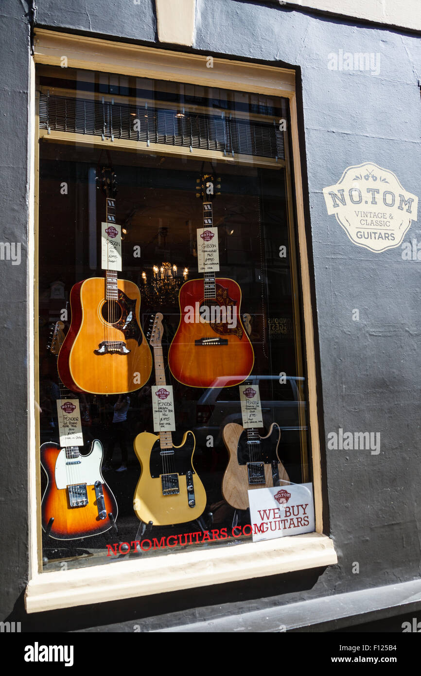 Guitars in window of N.O.T.O.M shop, Denmark Street, Tin Pan Alley, London, Soho, England, UK, United Kingdom Stock Photo