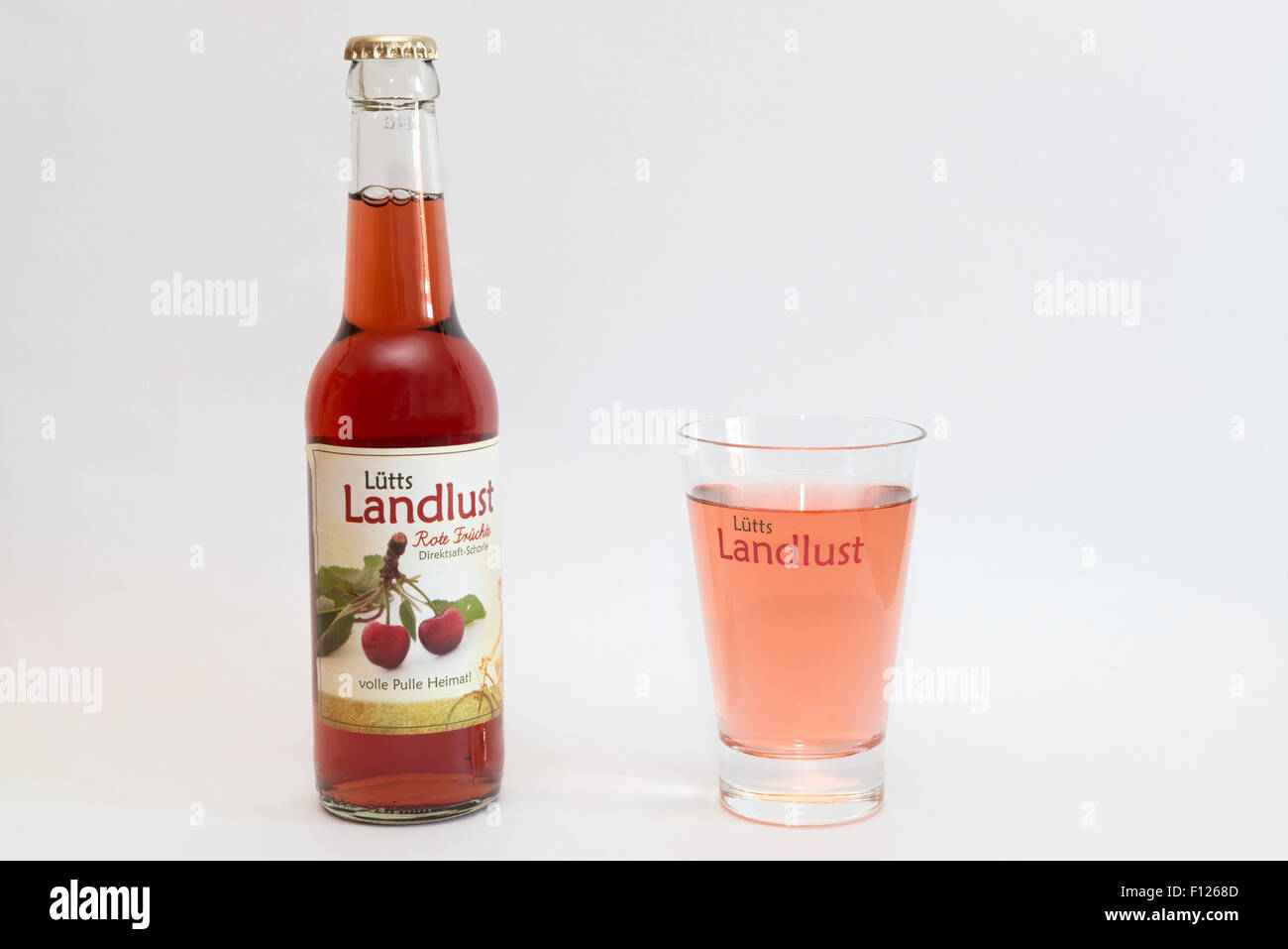 Lutts Landlust red fruit juice mixed with mineral water Stock Photo