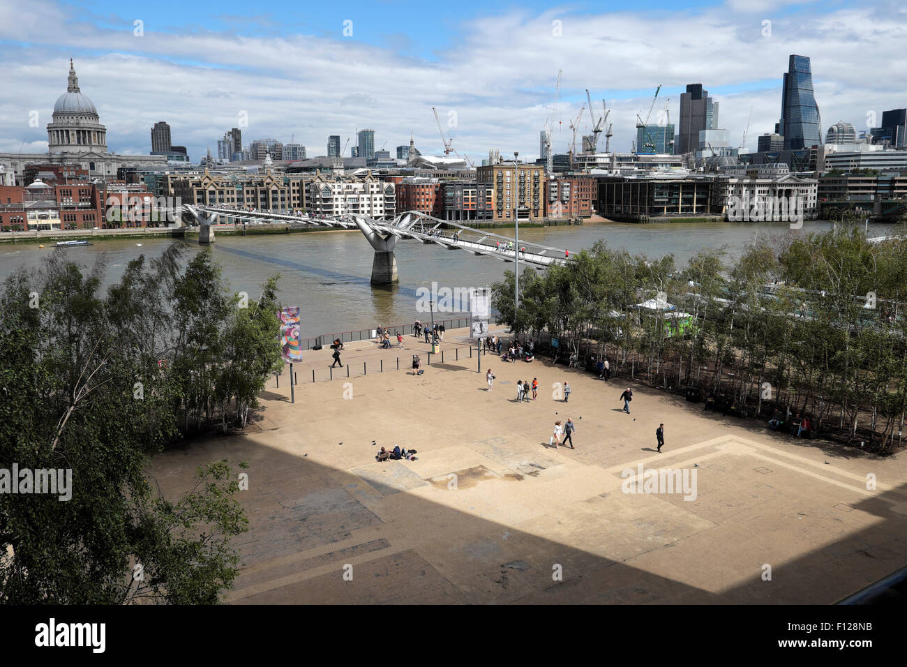 View of St Paul's Cathedral, River Thames, Millennium Bridge and the City of London from Tate Modern Art Gallery London UK  KATHY DEWITT Stock Photo
