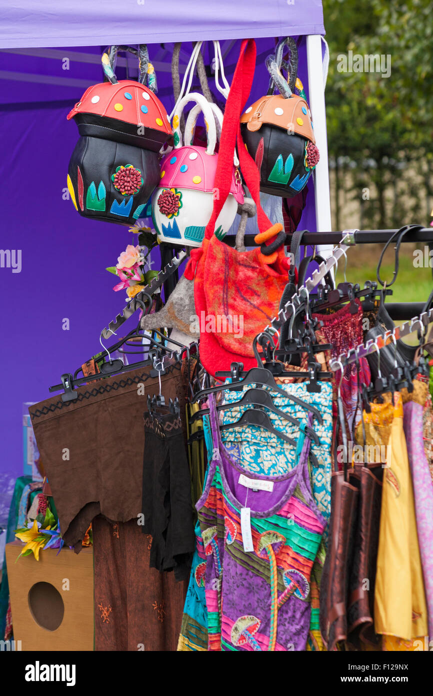 Stall selling toadstool handbags and clothes at the New Forest Fairy Festival, Burley, Hampshire, UK in August Stock Photo