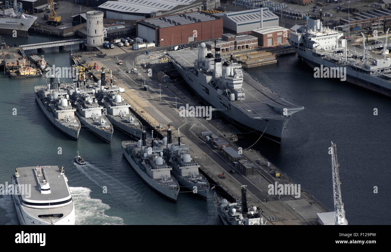 AJAXNETPHOTO. -  24TH AUGUST, 2011. PORTSMOUTH, ENGLAND. - (L-R) WARSHIPS LAID UP - ROYAL NAVY TYPE 43 DESTROYERS, INVINCIBLE CLASS AIRCRAFT CARRIER AND RFA FLEET SUPPORT TANKER LAID UP IN THE NAVAL BASE AWAIT DISPOSAL.  PHOTO:JONATHAN EASTLAND/AJAX REF:D2X110209 1554 Stock Photo