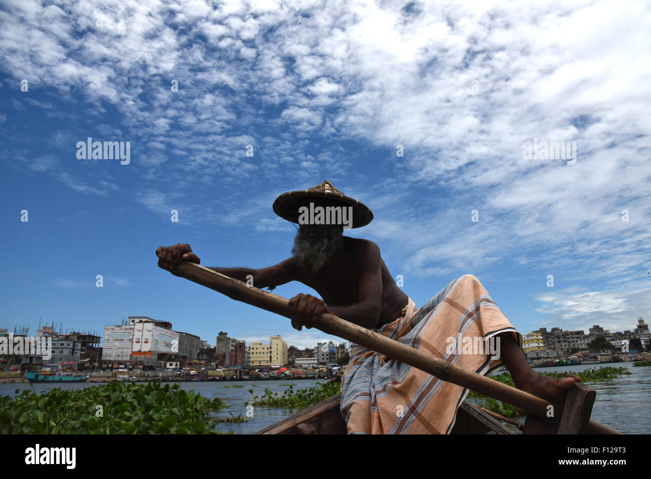 Man driving boat asia hi-res stock photography and images - Alamy