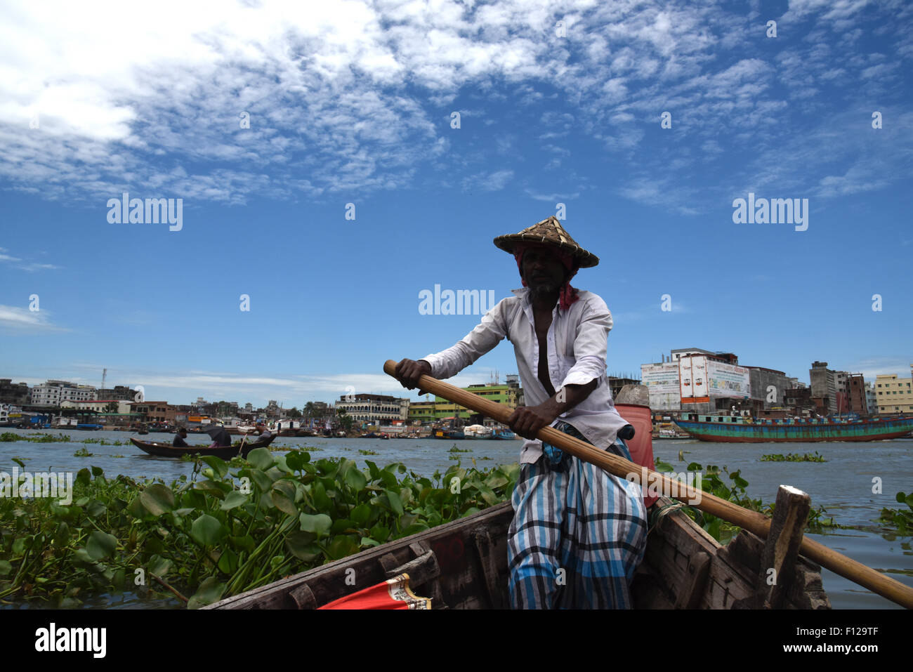 Man driving a boat hi-res stock photography and images - Alamy
