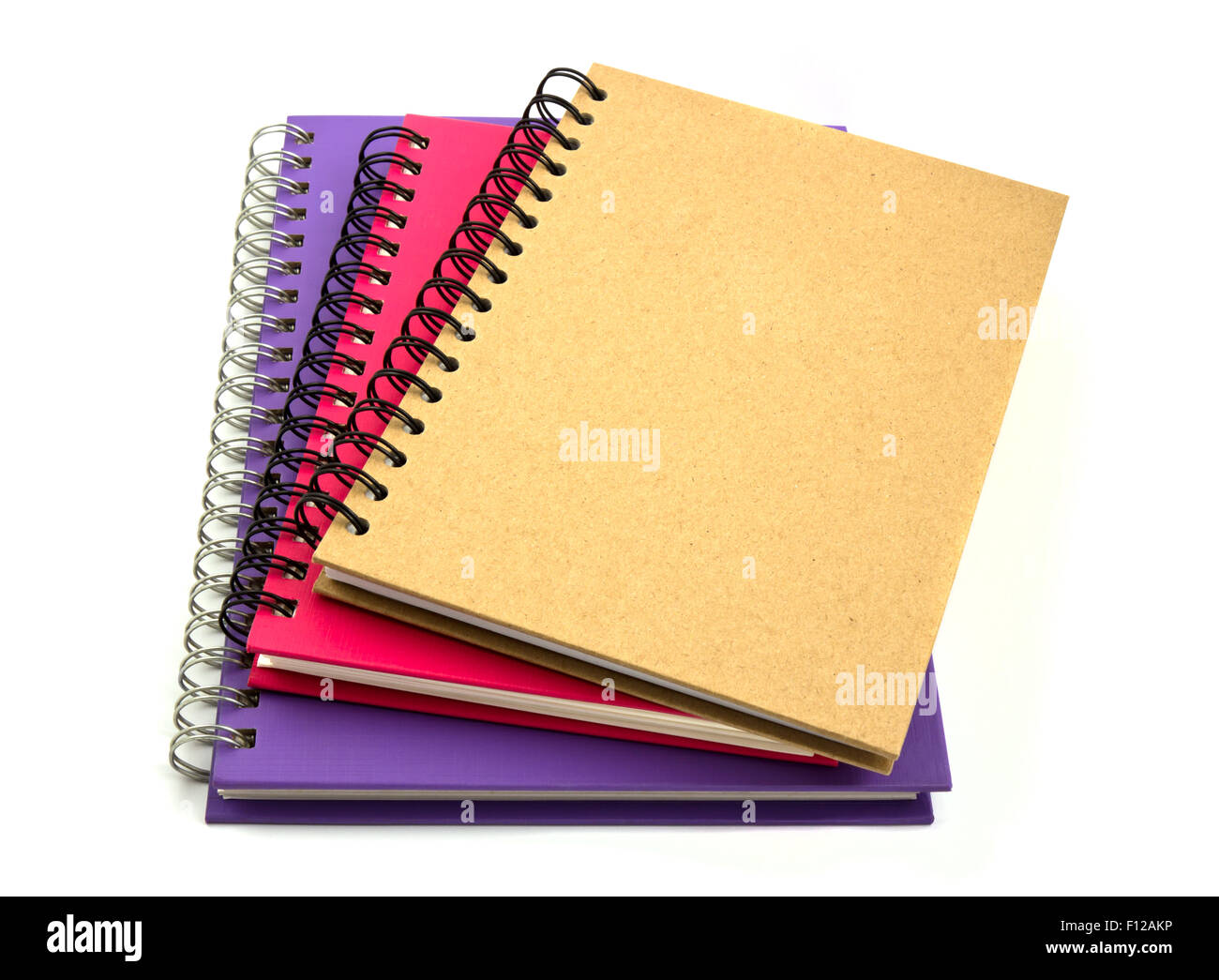Premium Photo | Stack of ring binder book isolated on white