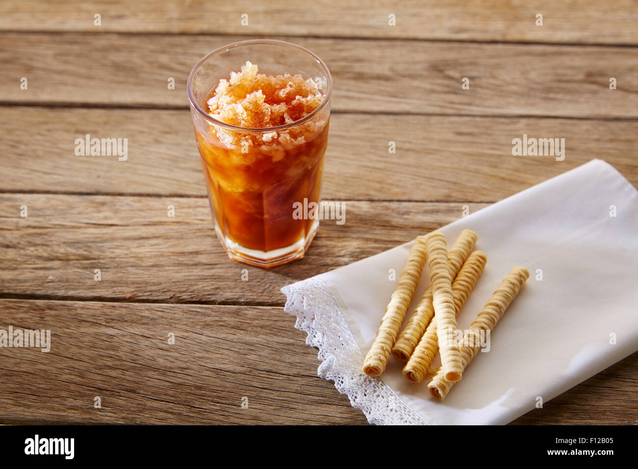 Coffee smoothie with wafers on vintage  wood table Stock Photo