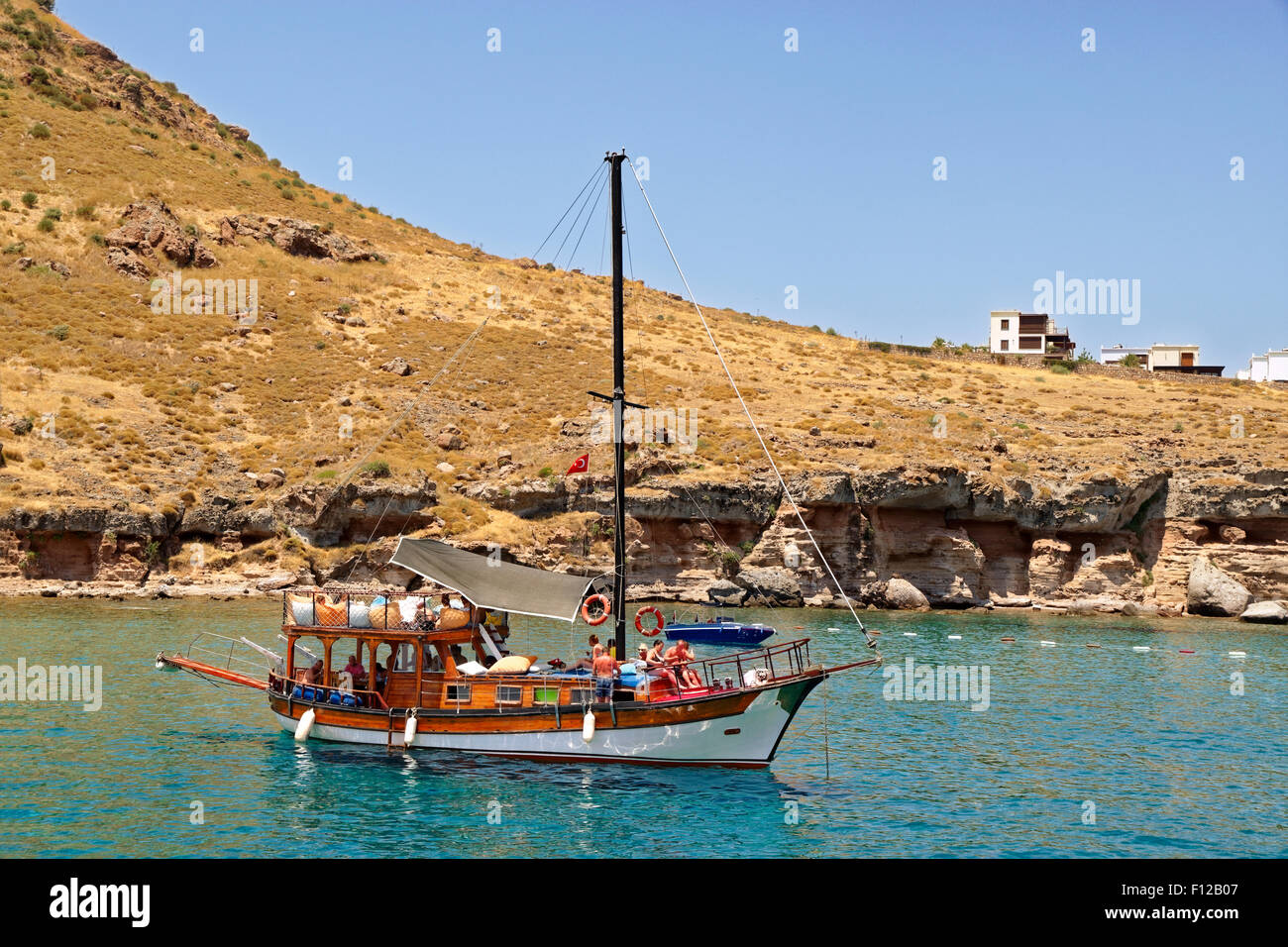 Small Gulet Day-trip cruise boat at anchor near Bodrum in Turkey Stock Photo