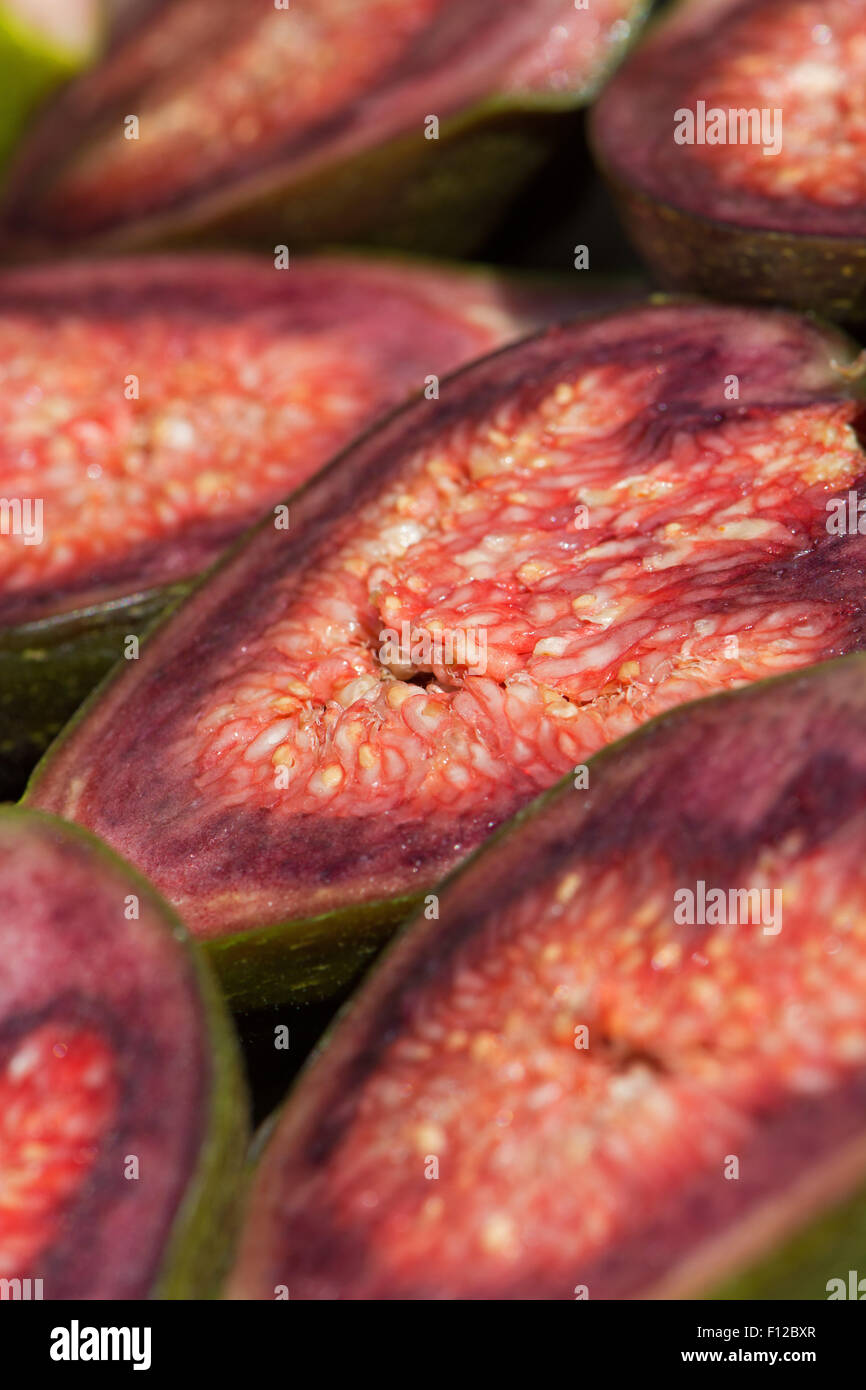 Halved fresh Brown Turkey figs Stock Photo