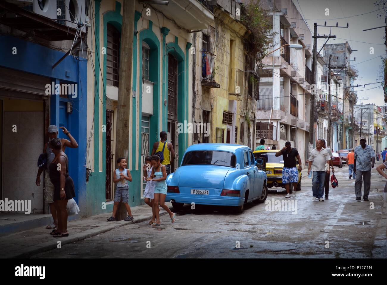 Residential street scene on the outskirts of town, after rainfall, Havana, Cuba. Stock Photo