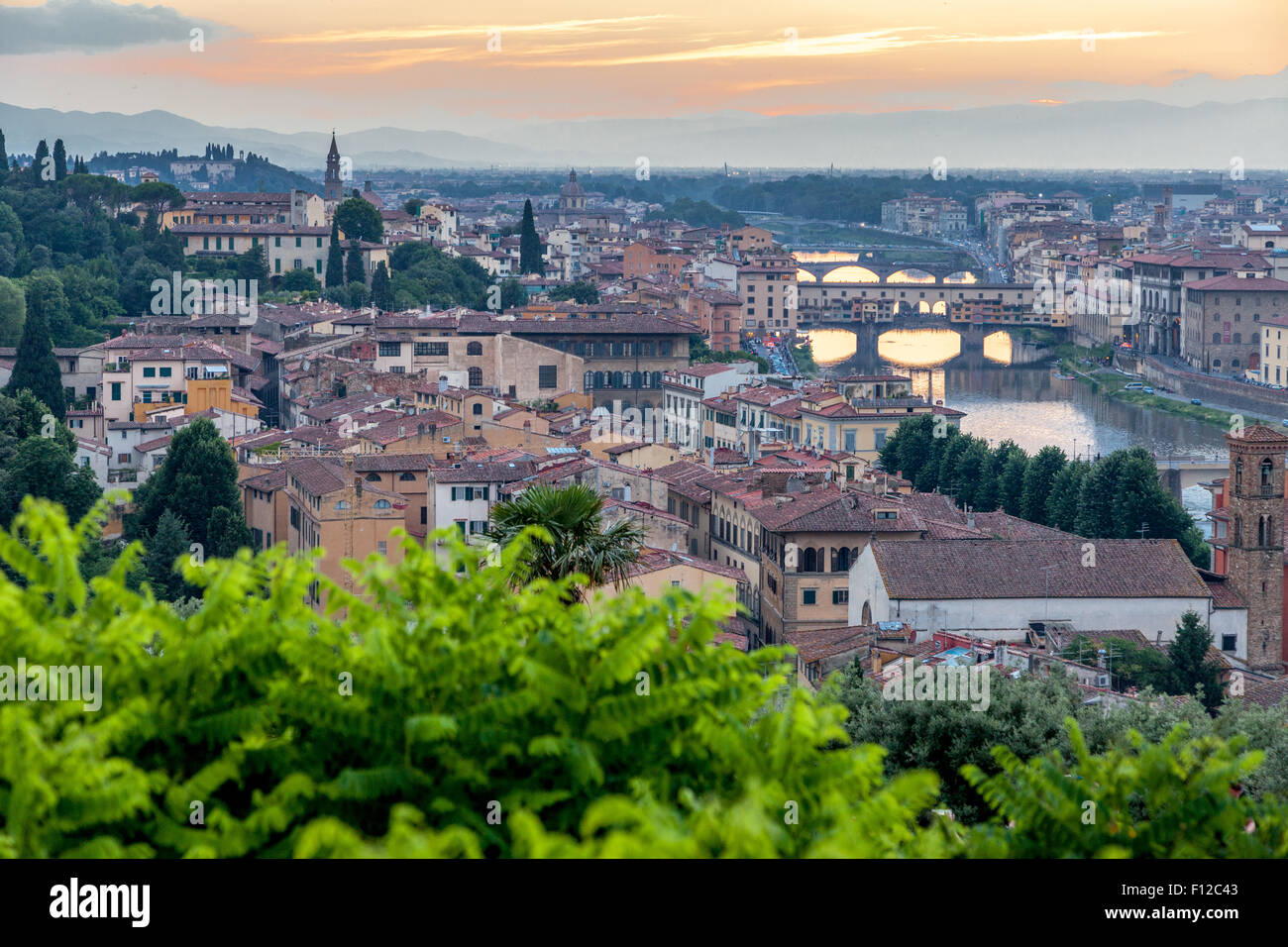 Evening view across Florence from Piazzale Michelangelo looking at Cattedrale di Santa Maria del Fiore Stock Photo
