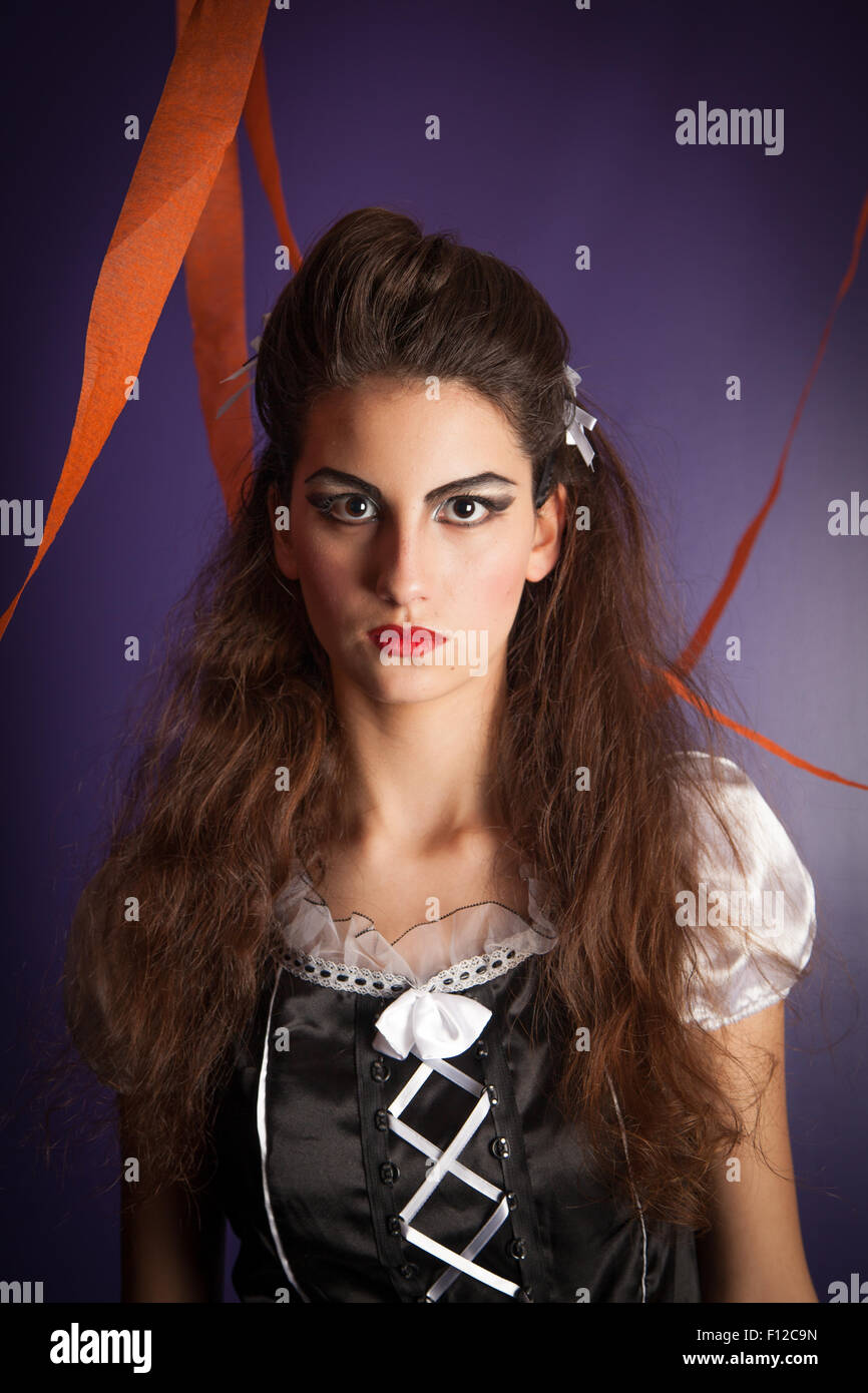 Girl showing things about Halloween Stock Photo
