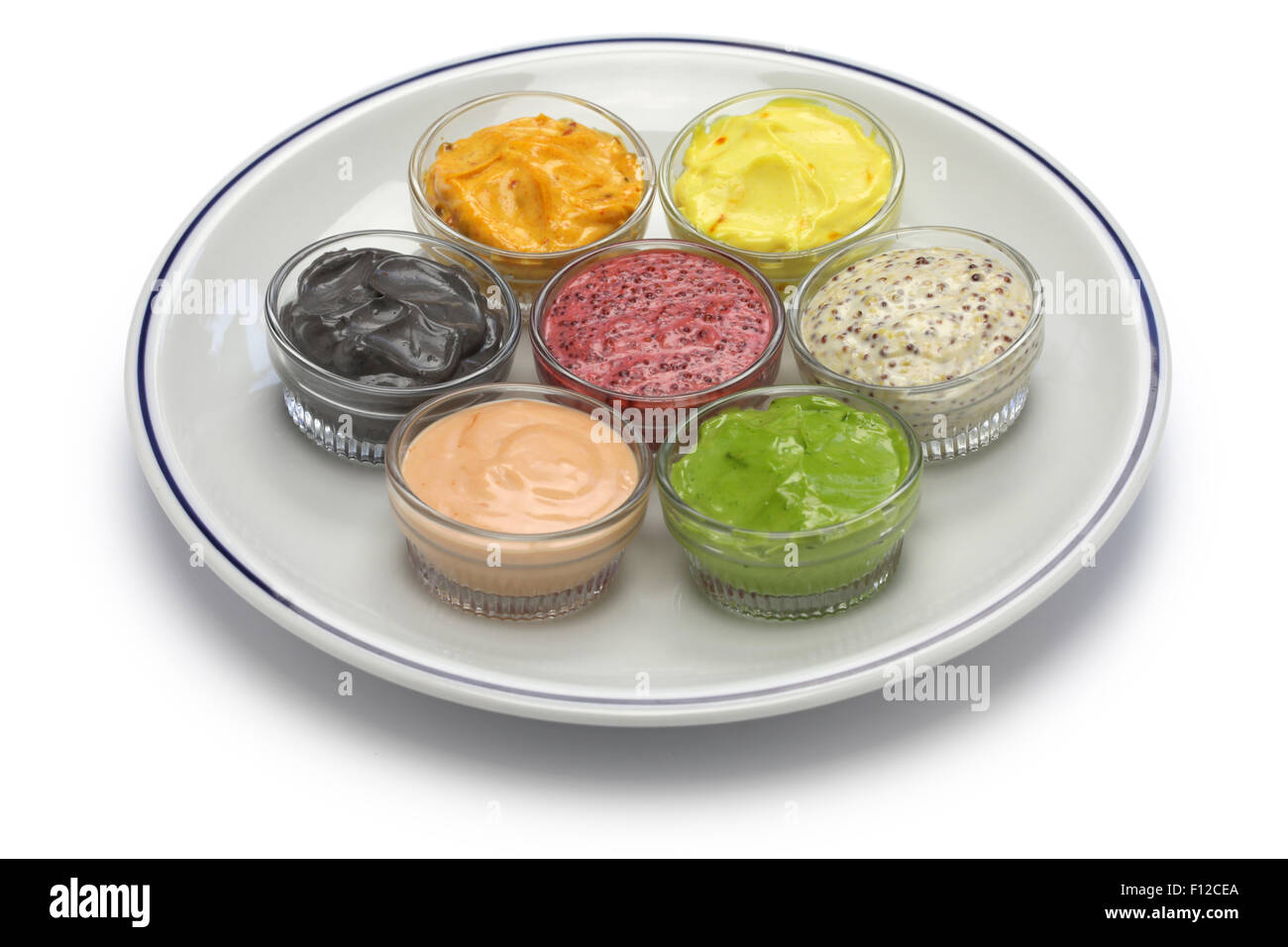 homemade assorted mayonnaise sauce on white background black sesame,thousand island,squid ink,green tea,saffron,cassis,mustard Stock Photo