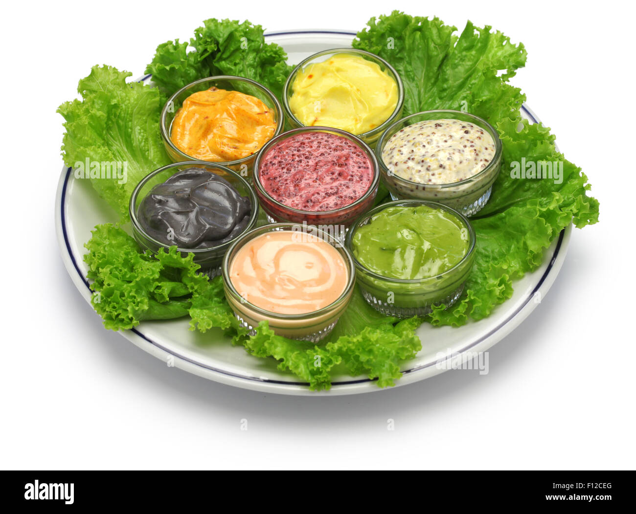 homemade assorted mayonnaise sauce on white background black sesame,thousand island,squid ink,green tea,saffron,cassis,mustard Stock Photo