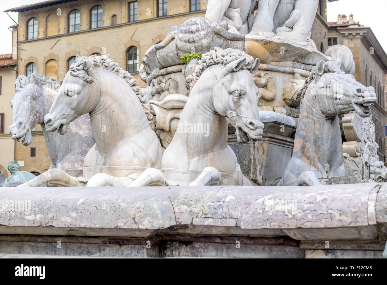 Base of Neptune Fountain showing horses in Piazza della Signoria statues, Florence, Italy Stock Photo