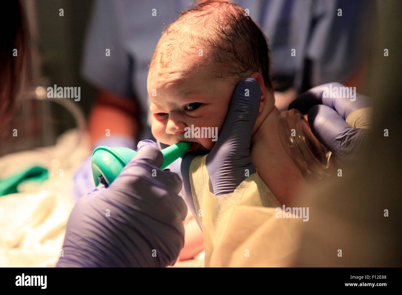 The first minutes of life of the newborn girl Stock Photo - Alamy