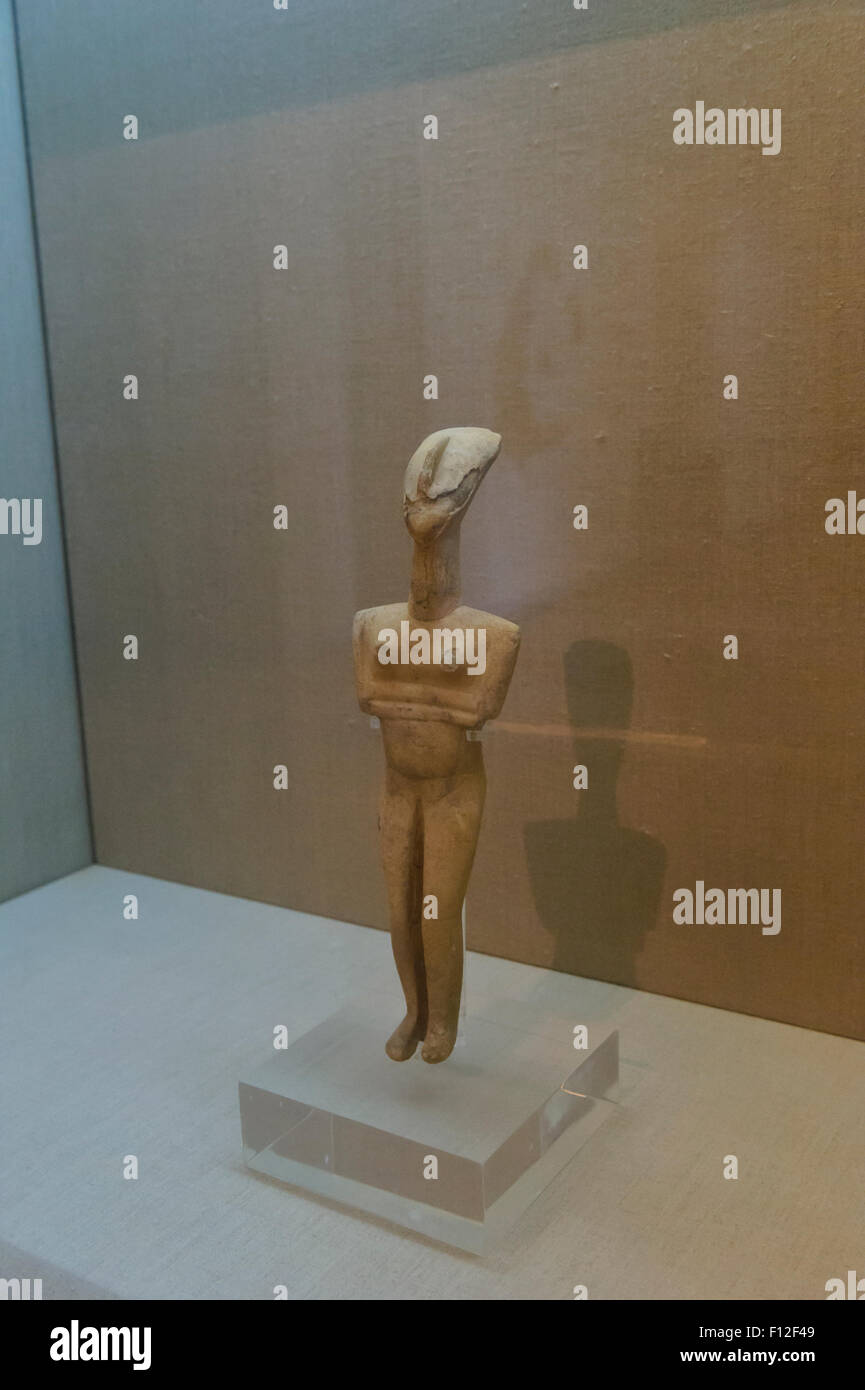 An ancient figurine on display in the Museum of Prehistoric Thera