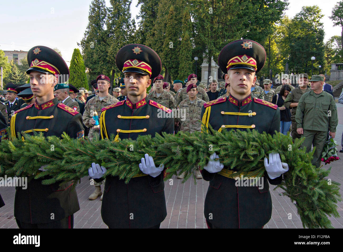 Ukrainian Army Honor Guard carry ceremonial wreath to honor the war dead during Independence Day ceremonies August 24, 2015 in Lviv, Ukraine. Stock Photo