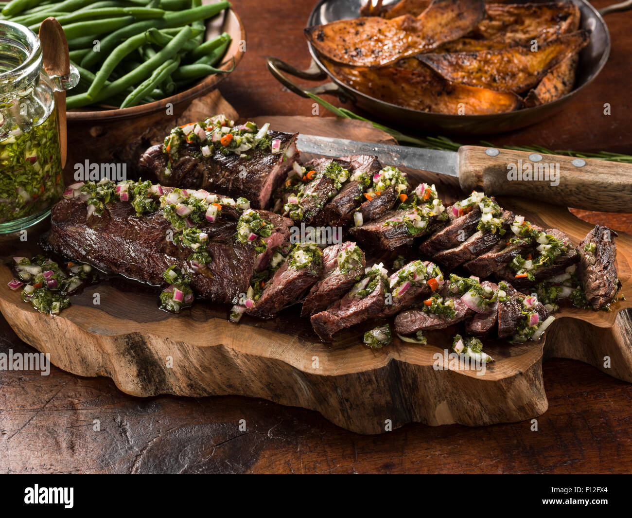 Onglet beef with chimichurri sauce Stock Photo