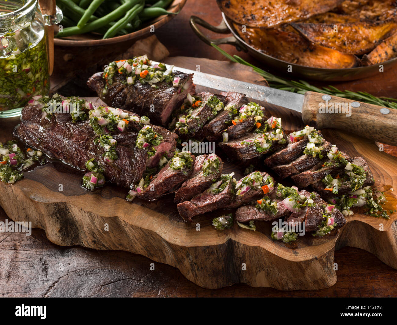 Onglet beef with chimichurri sauce Stock Photo