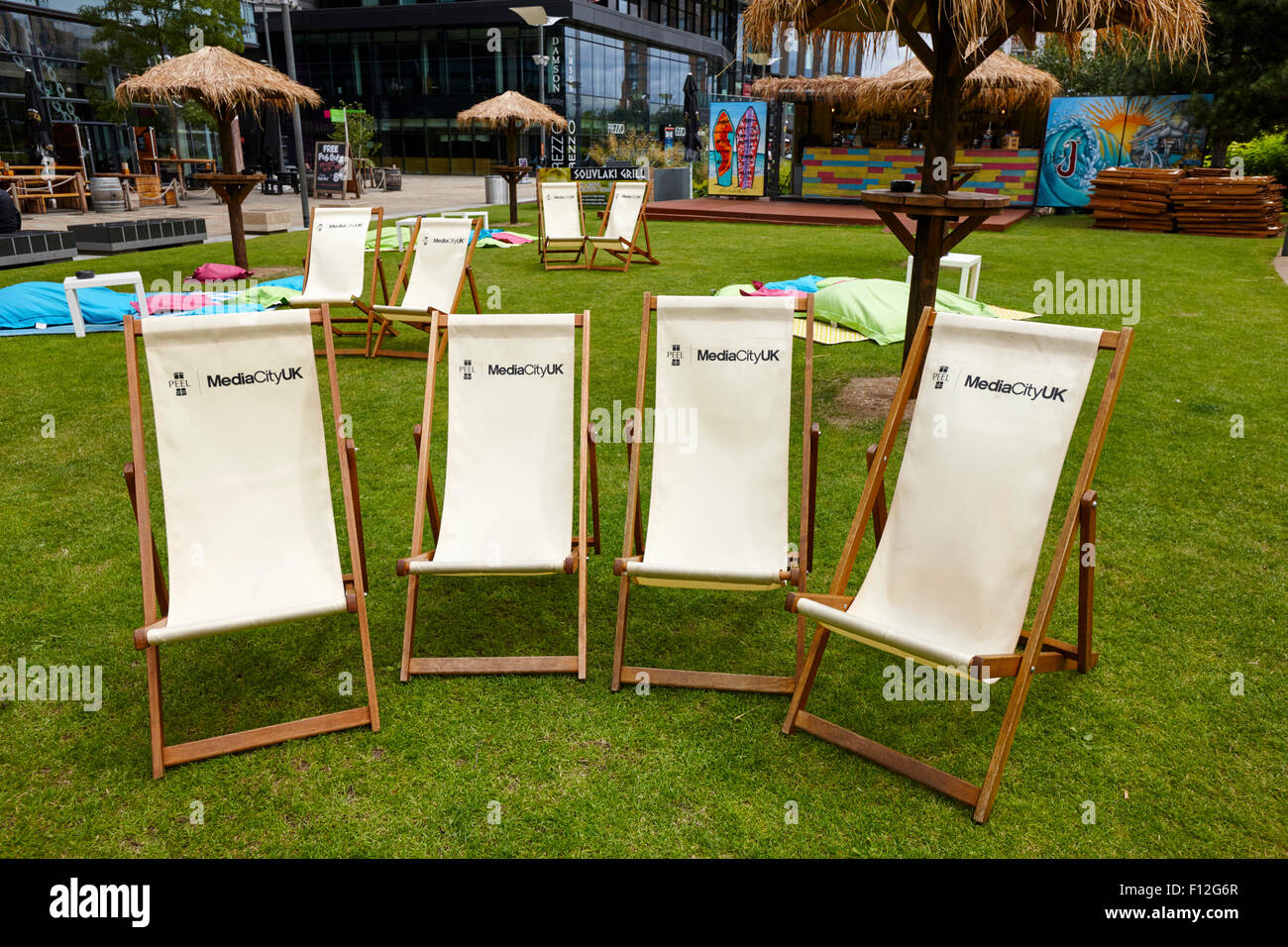 deckchairs on the grass at the dockyard pub mediacity salford Manchester uk Stock Photo