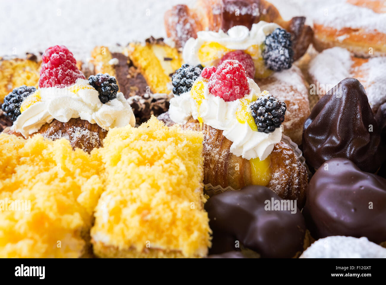 In the pictured typical italian pastries with cream,choccolate,rasperry