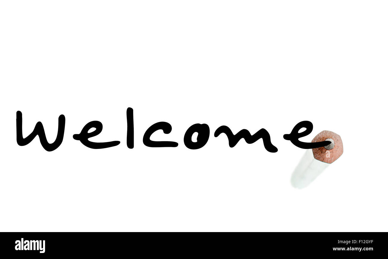 Welcome inscription with a tip of a graphite pencil on a white background Stock Photo