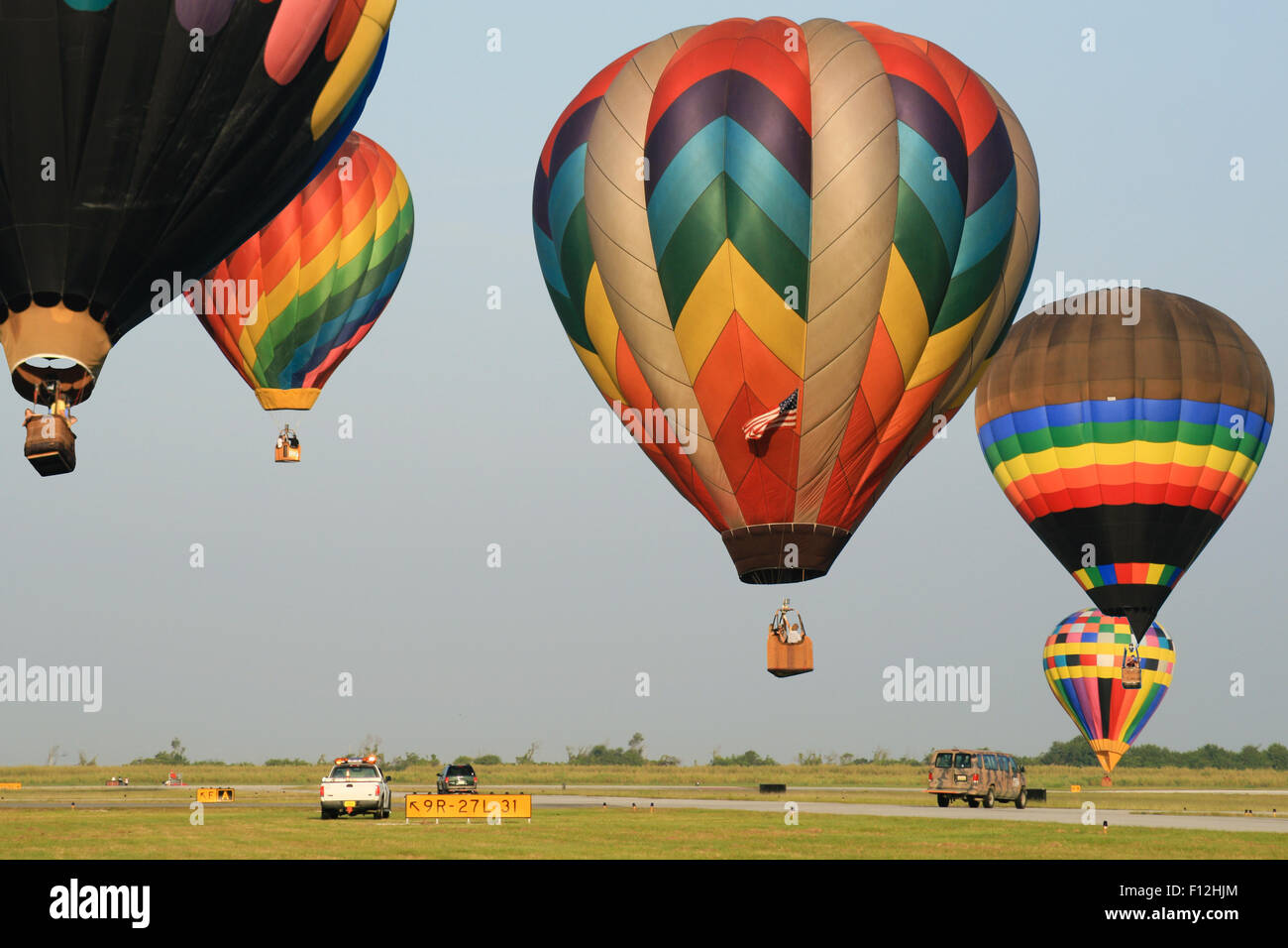 Hot air balloon landing during Sunrise Hot Air Balloon Race, Miami, Miami-Dade County, Florida, USA Stock Photo