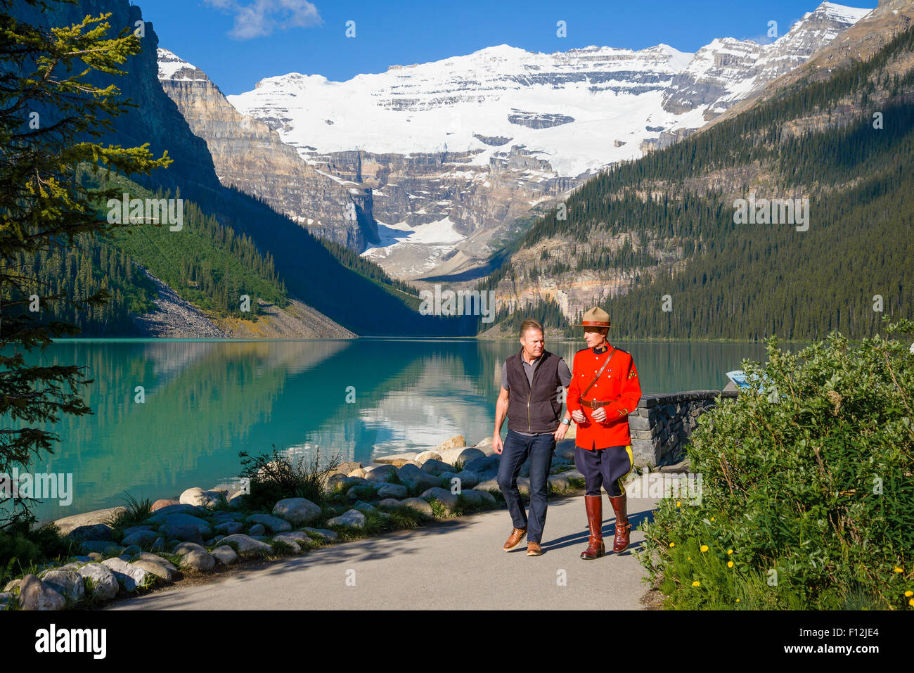 RCMP Officer at Lake Louise, Banff National Park, Alberta, Canada Stock Photo