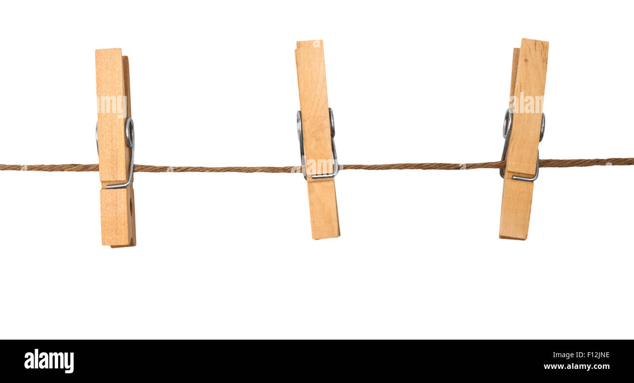 three clothespins on rope Stock Photo Alamy
