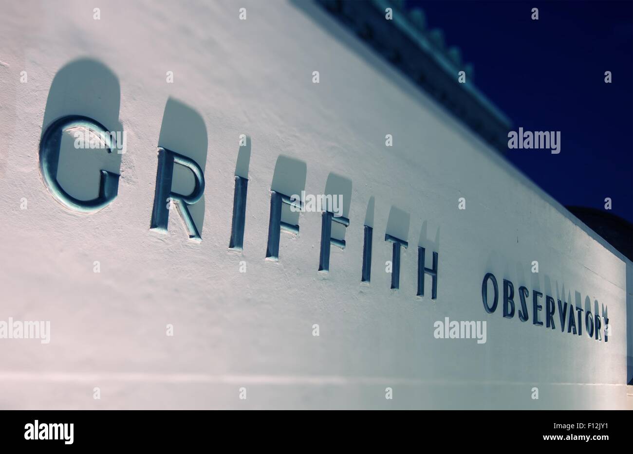 Griffith Observatory Wall Sign at Night. Los Angeles, California, United States. Stock Photo
