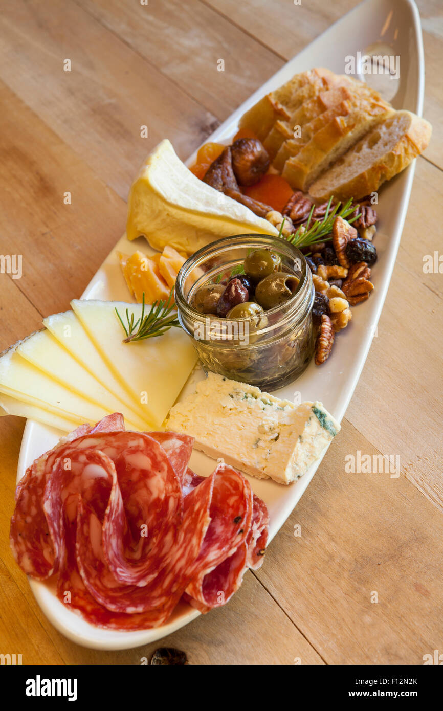 dish of salami, cheese, nuts, fruit and bread, Roblar Winery, Santa Ynez Valley, California Stock Photo