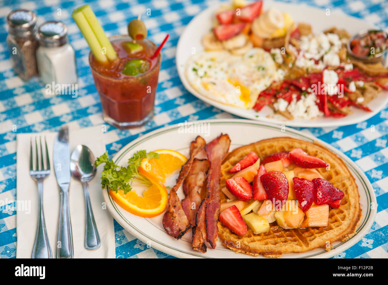 O.J.Waffle with bacon, Huevos Paradiso and a Bloody Mary, The Paradise Cafe, Santa Barbara, California Stock Photo