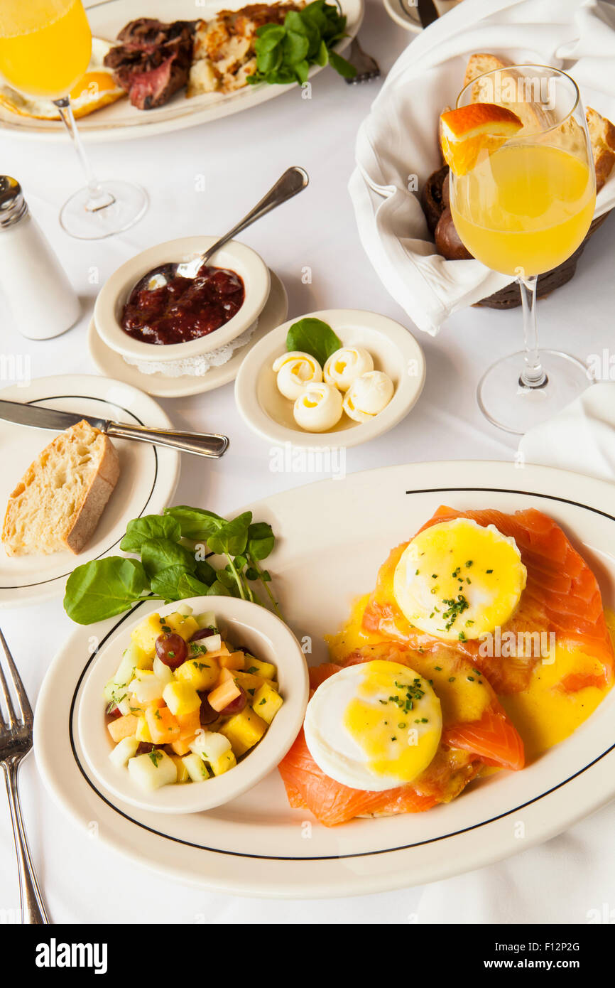 smoked salmon eggs benedict, steak and eggs and mimosas for brunch, Lucky's, Montecito, California Stock Photo