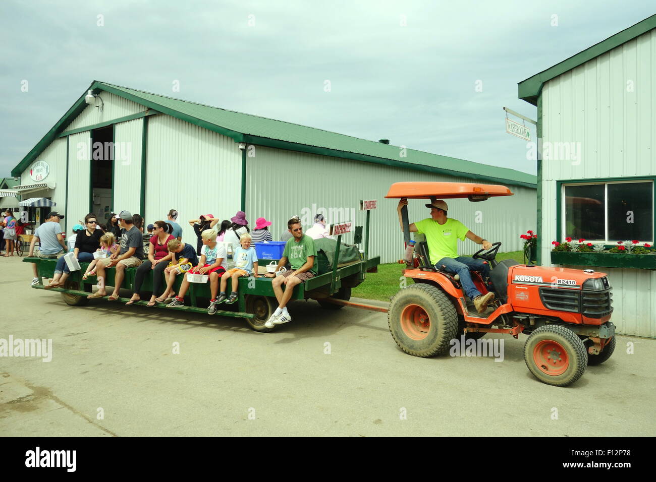 Tractor pulling visitors at a farm in Ontario, Canada Stock Photo