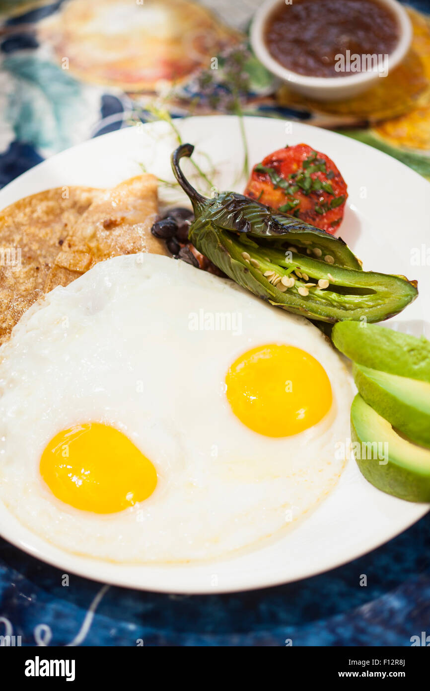 huevos rancheros with tortilla, roasted chile and avocado, Bella Vista Restaurant, Biltmore Hotel, Santa Barbara, California Stock Photo