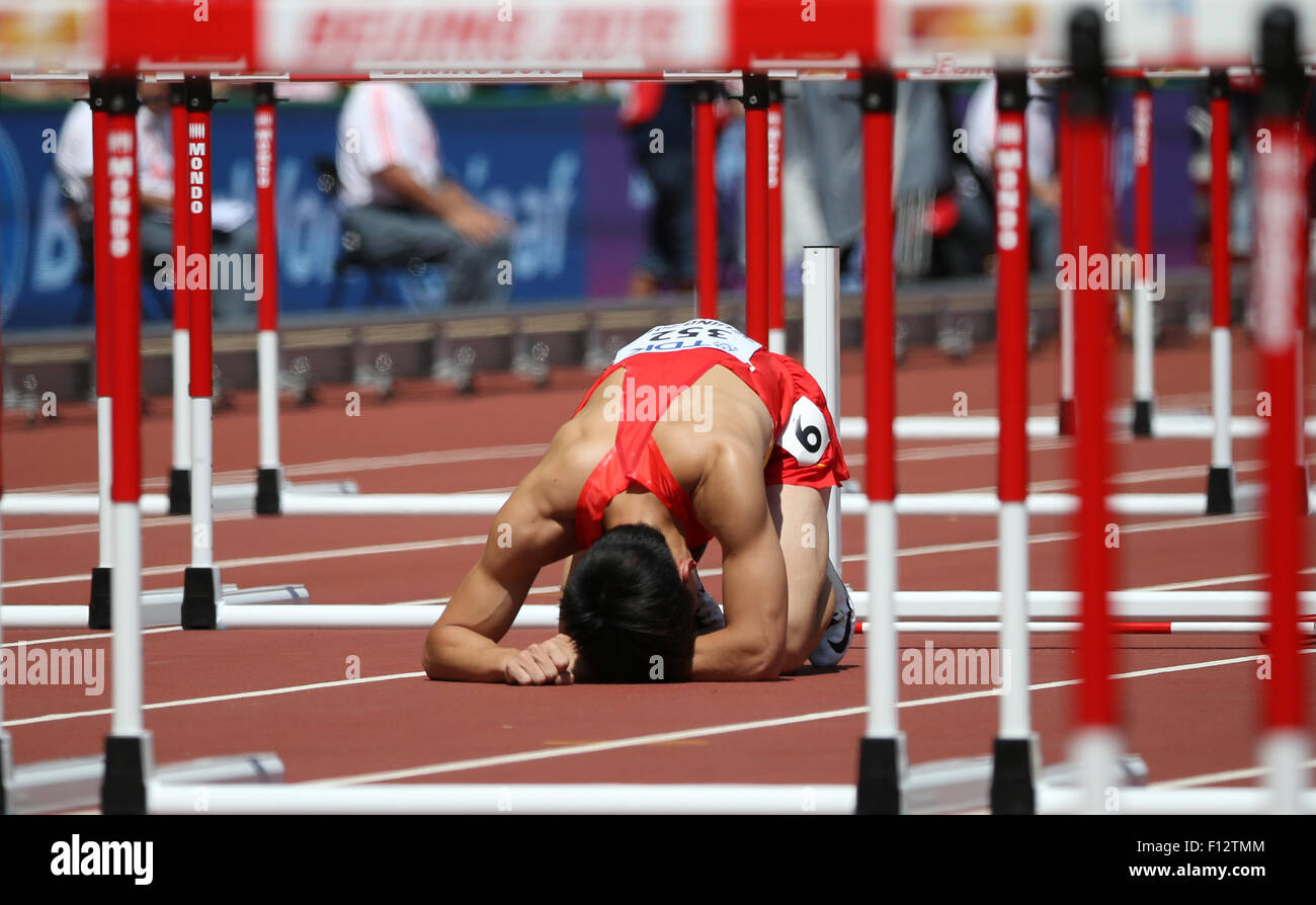 Beijing, China. 26th Aug, 2015. Zhang Honglin of China reacts after ...