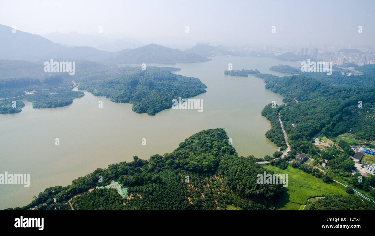 Shenzhen. 24th Aug, 2015. An aerial photo taken on Aug. 24, 2015 shows a reservoir of Shenzhen, south China's Guangdong Province. Shenzhen Special Economic Zone, established on Aug. 26 in 1980 and situated immediately north of Hong Kong Special Administrative Region, is China's first and one of the most successful Special Economic Zones. © Mao Siqian/Xinhua/Alamy Live News Stock Photo