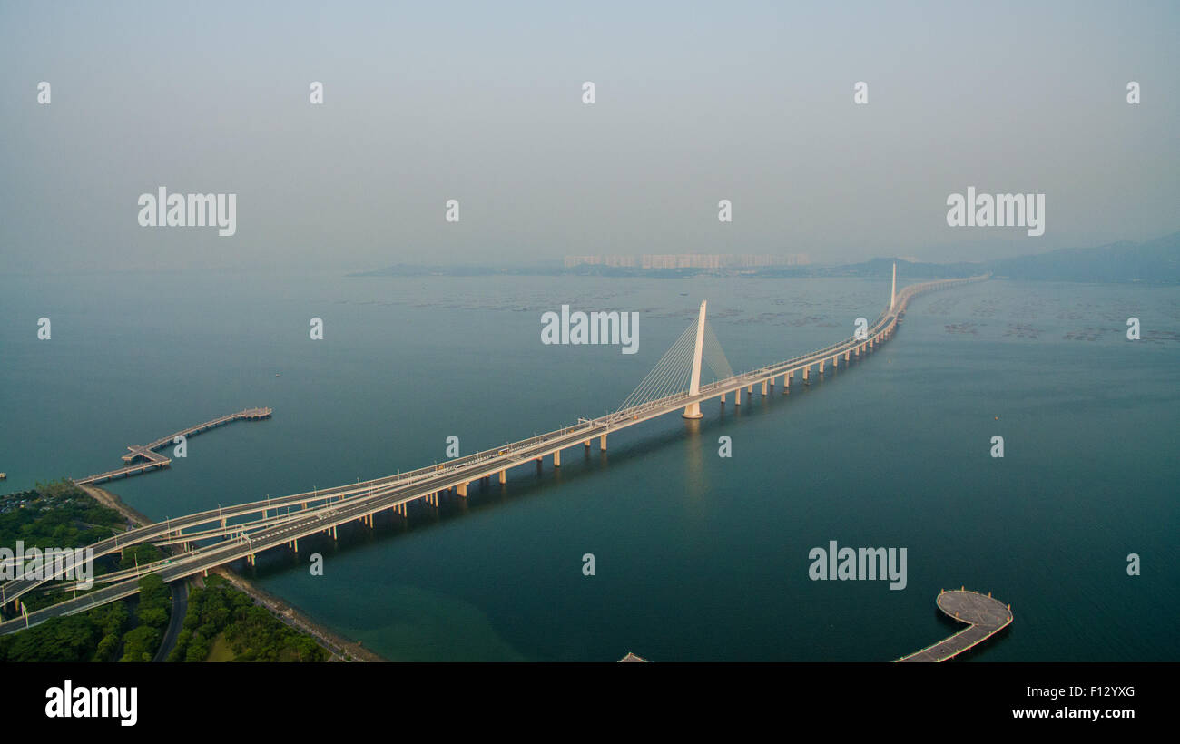 Shenzhen. 25th Aug, 2015. An aerial photo taken on Aug. 25, 2015 shows the Shenzhen Bay Bridge in Shenzhen, south China's Guangdong Province. Shenzhen Special Economic Zone, established on Aug. 26 in 1980 and situated immediately north of Hong Kong Special Administrative Region, is China's first and one of the most successful Special Economic Zones. © Mao Siqian/Xinhua/Alamy Live News Stock Photo