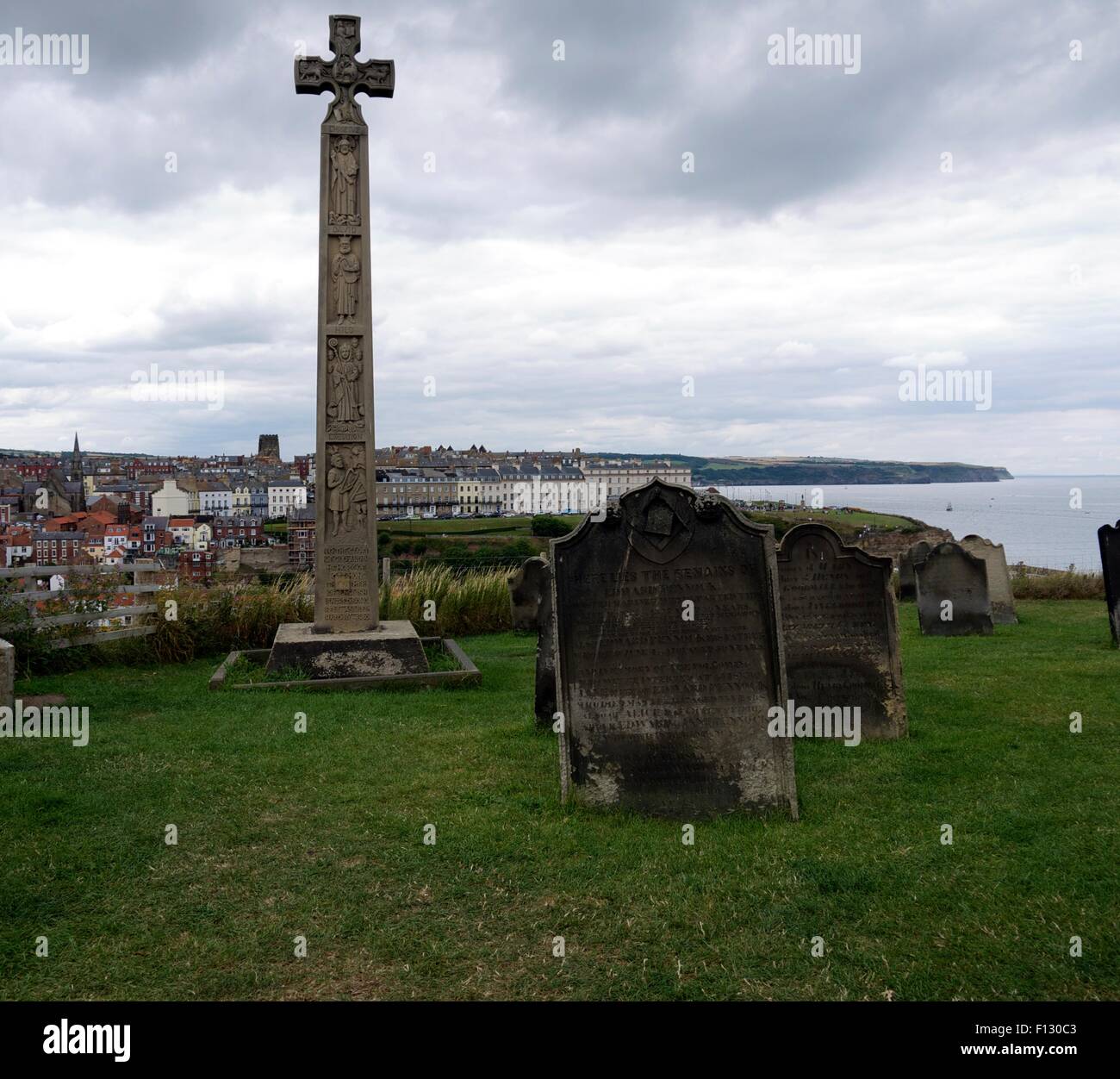 Graveyard at the top of a hill, with Whitby in the background Stock Photo