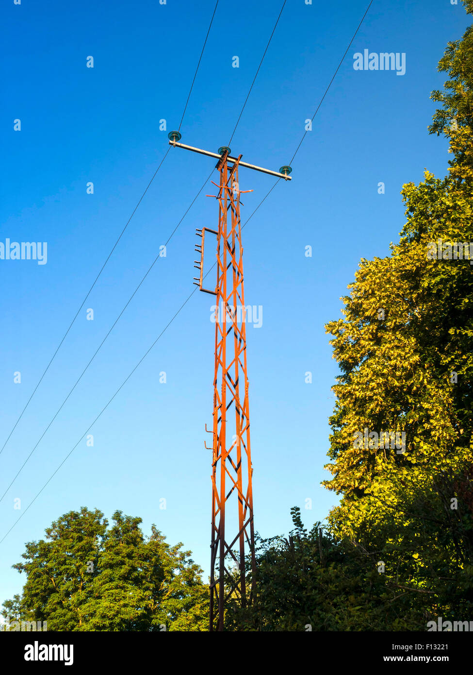 Old high tension electricity wires on lattice post - France Stock Photo -  Alamy