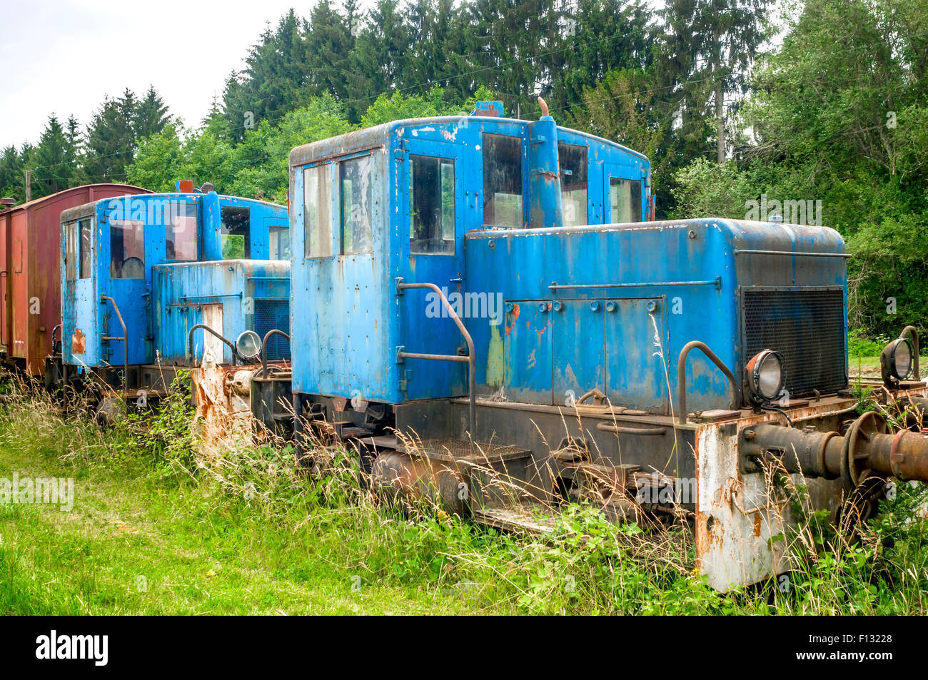 Old diesel locomotives awaiting restoration - France. Stock Photo