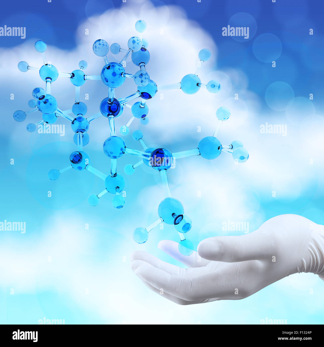 scientist doctor hand holds virtual 3d  molecular structure in the lab Stock Photo