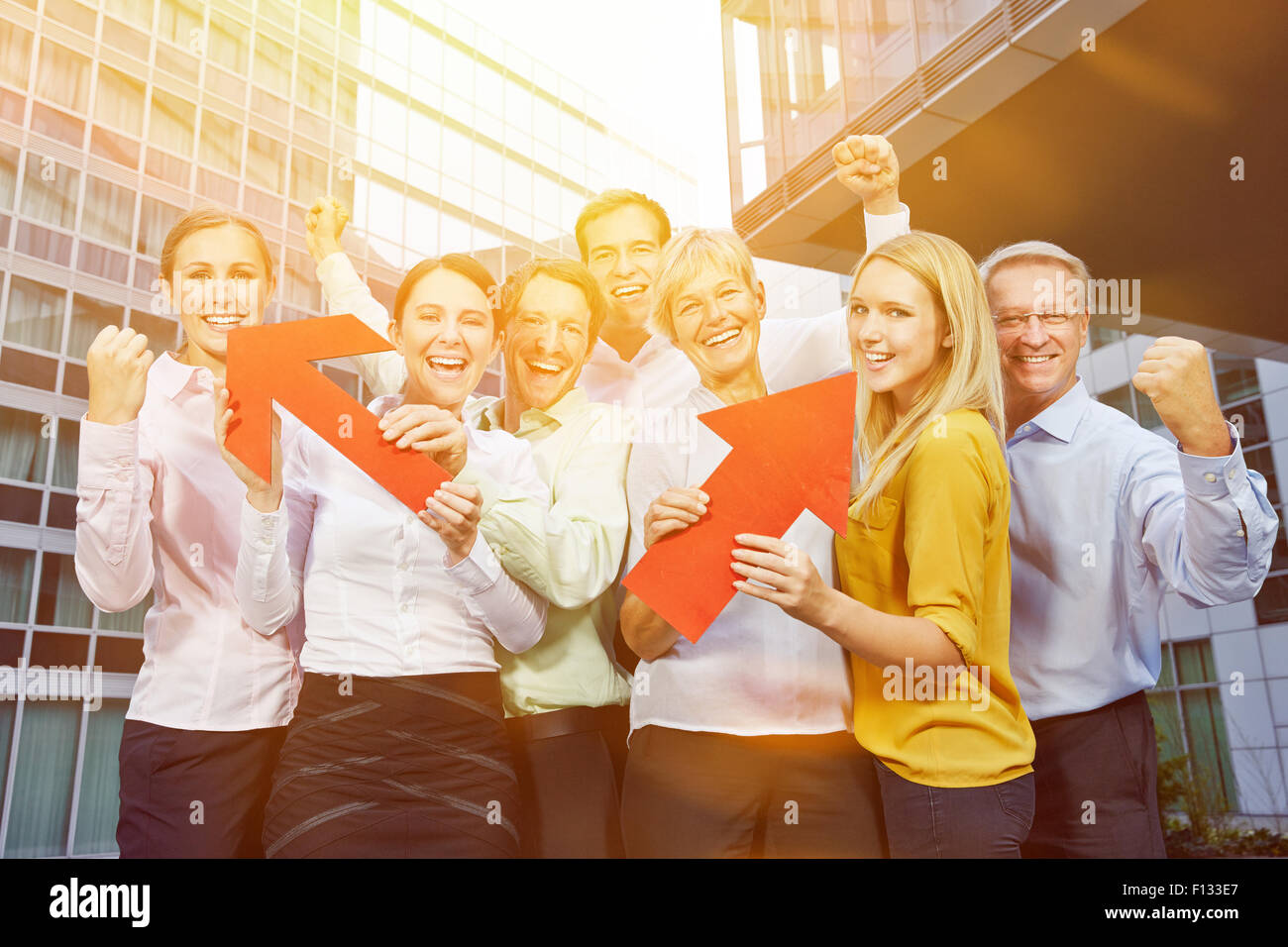 Cheering winner in a business people team on a sunny summer day Stock Photo