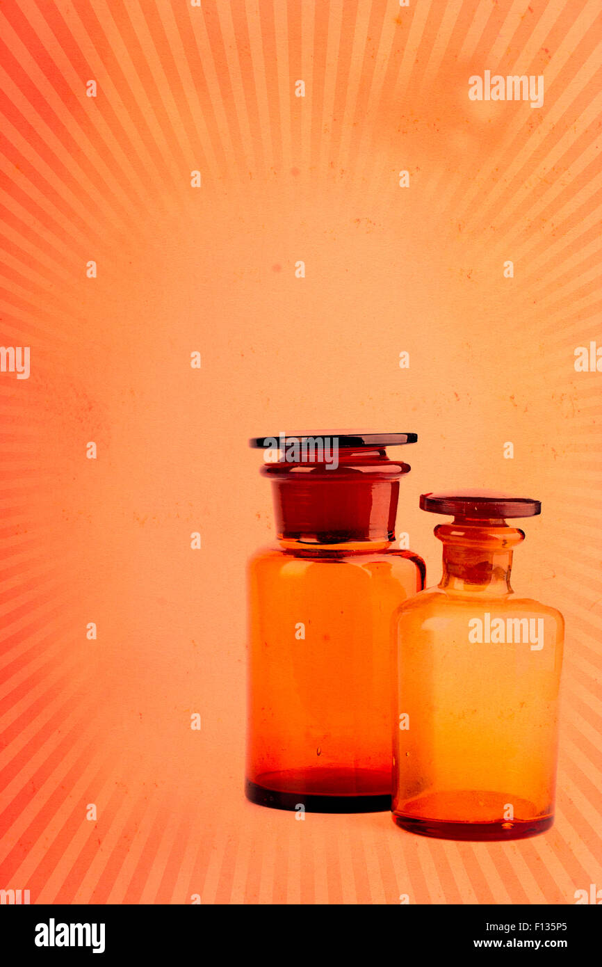 Vintage grunge background with medicine bottles and copy space Stock