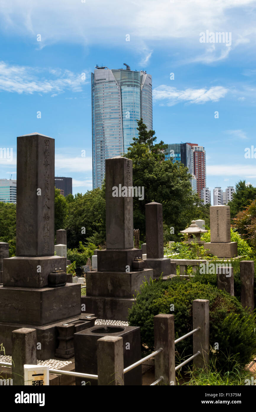 View of Roppongi Hills tower from Aoyama Cemetery in Tokyo, Japan Stock Photo