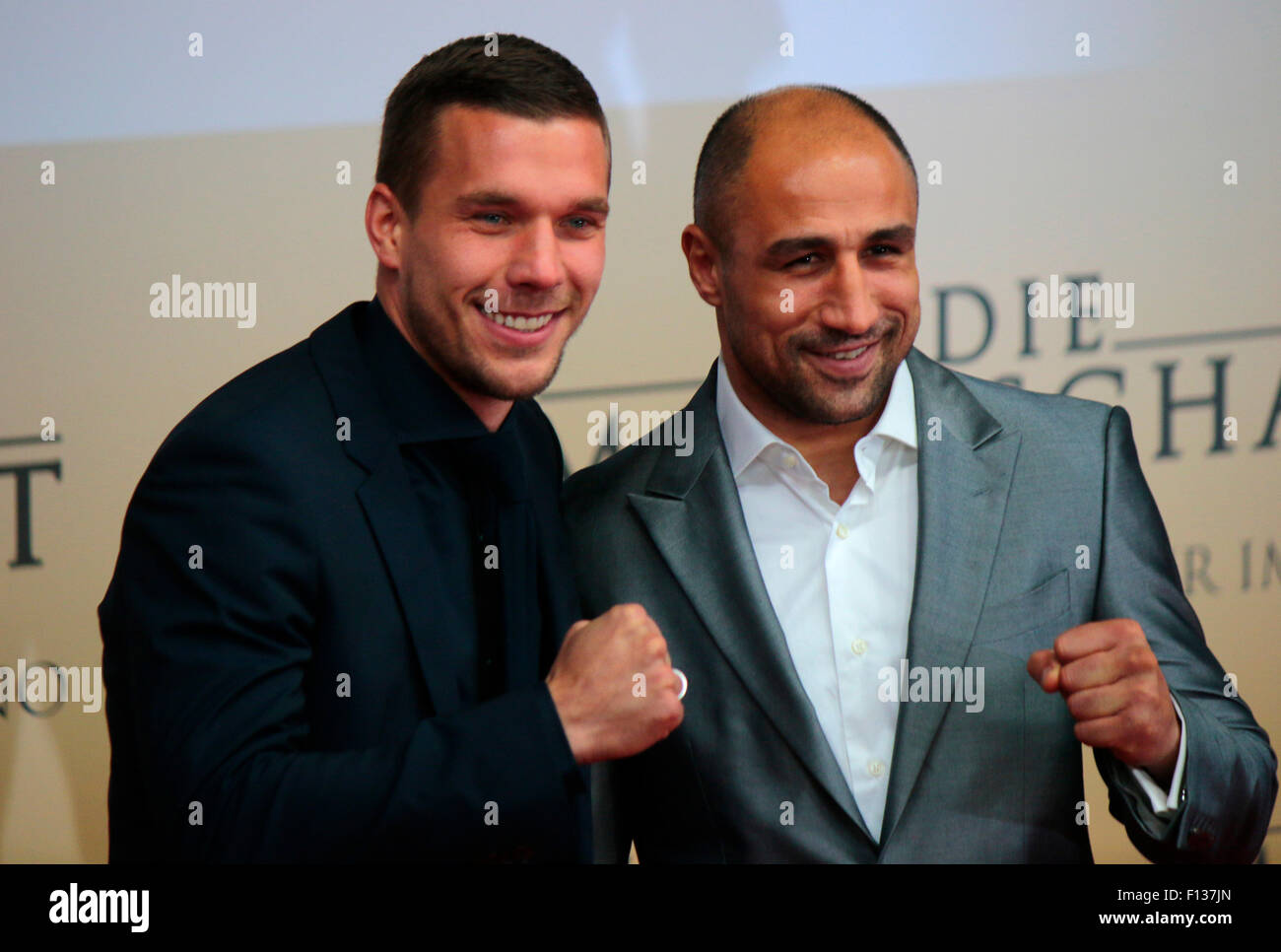 Lukas Podolski, Arthur Abraham - Premiere des Films ueber den gewinn der Fussball Weltmeisterschaft 2014 'Die Mannschaft', Sony Stock Photo