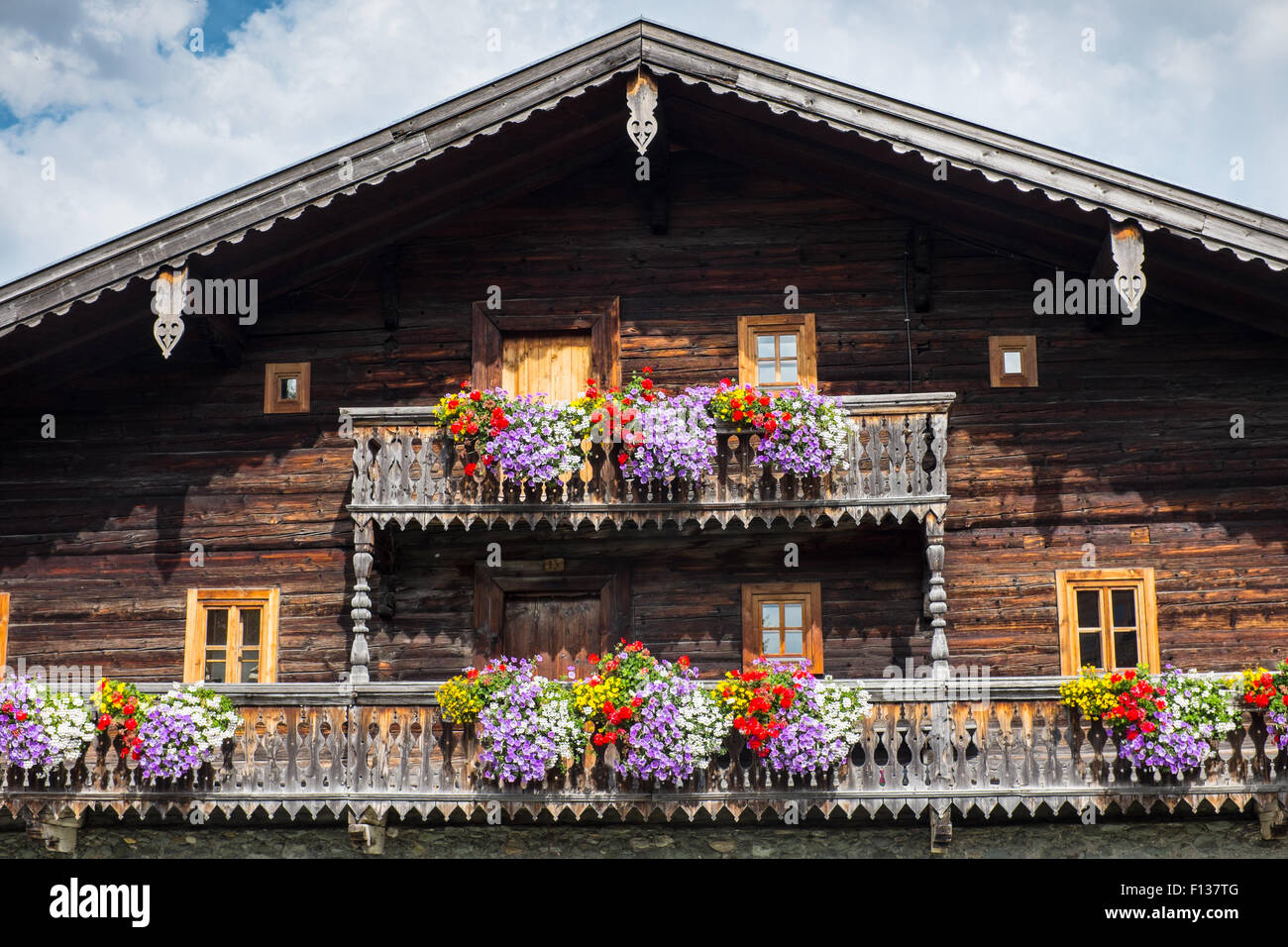 Traditional old Alpine house , Hollersbach im Pinzgau, Tirol, Austria Stock Photo