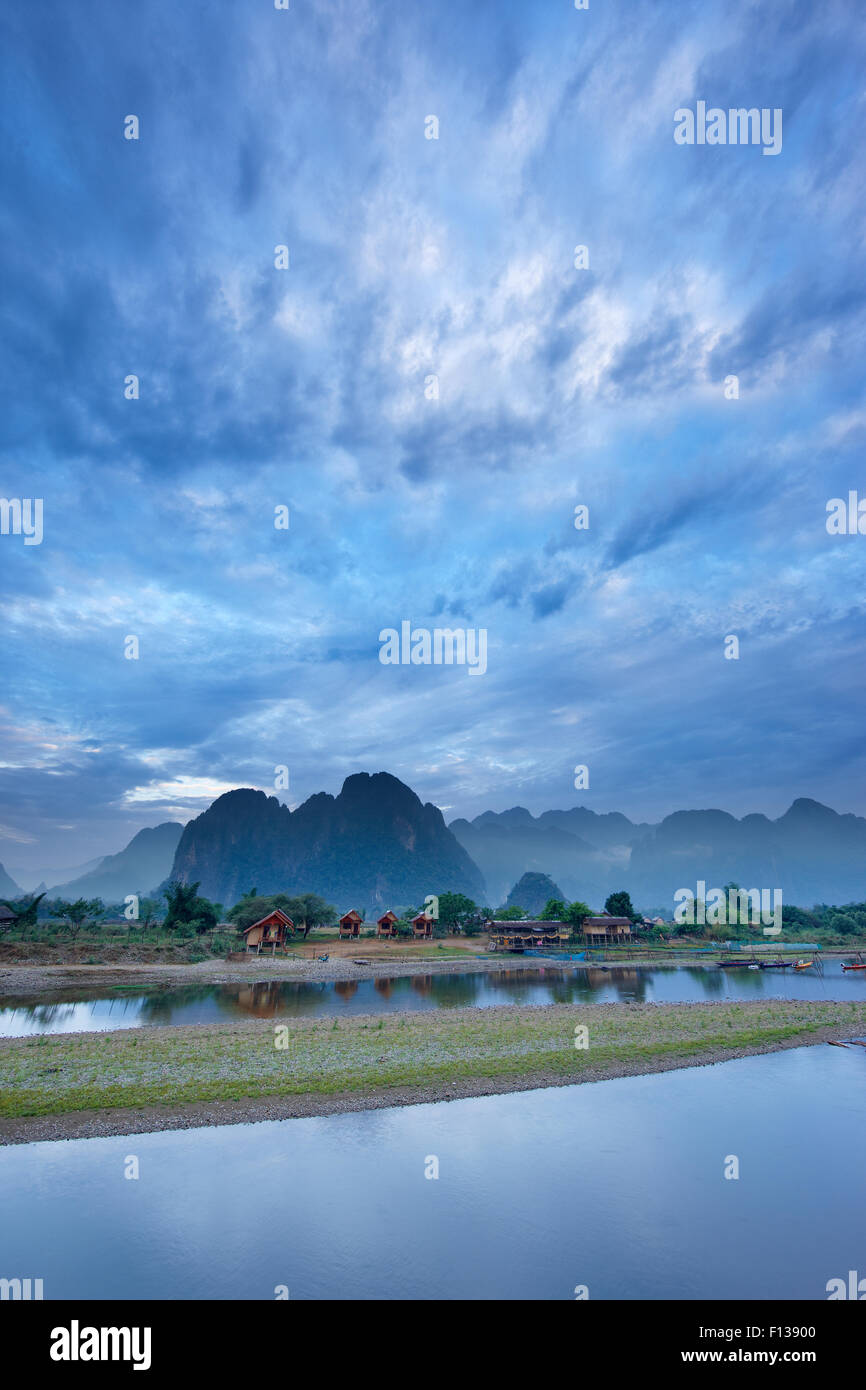 Dawn over the mountains and Nam Song River at Vang Vieng, Laos, March 2009. Stock Photo