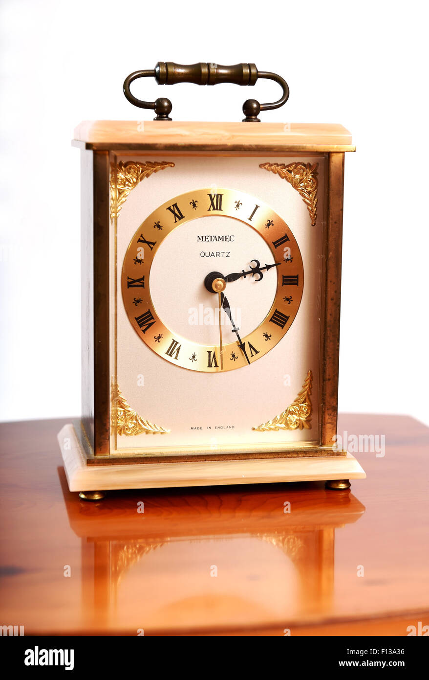 Metamec quartz carriage clock against white backdrop Stock Photo Alamy